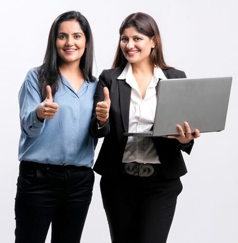 Two,Young,Indian,Business,Woman,Or,Employee,Showing,Thumps,Up
